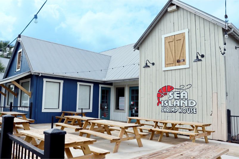 Sea Island Shrimp House South Park loction featuring their white and blue restaurant building