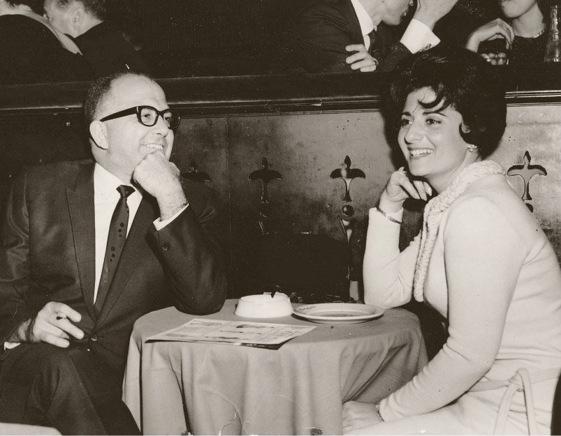 A black and white photo of Dan and Chrissy Anthony, the founders of Sea Island Shrimp House